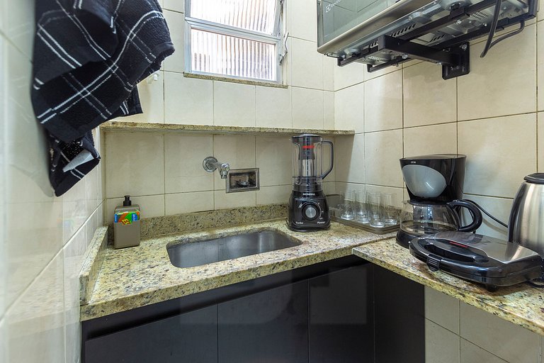 Charming Studio with Side View of the Beach