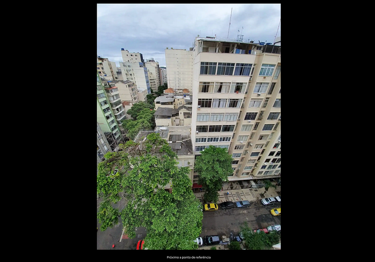 Charming Studio with Side View of the Beach