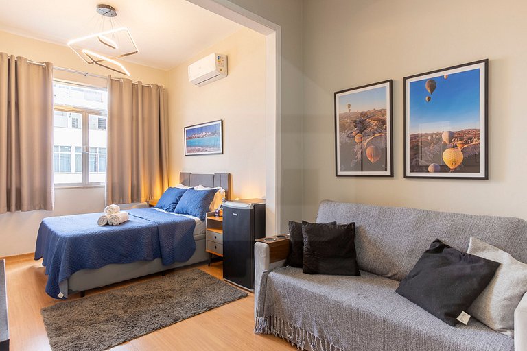 Charming Studio with Side View of the Beach