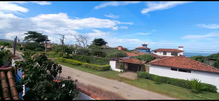 Conforto e Piscina ao Lado da Praia