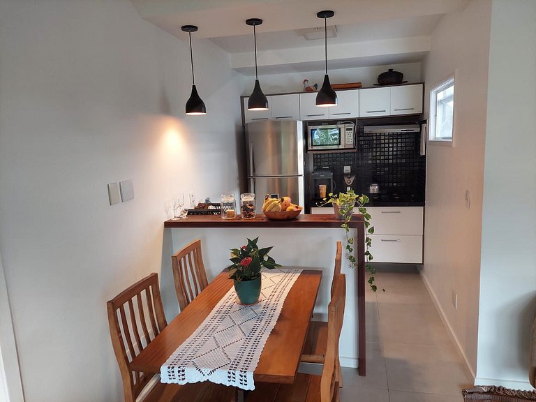 Conforto e Piscina ao Lado da Praia