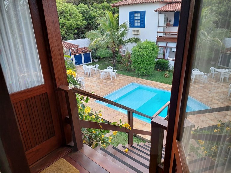 Conforto e Piscina ao Lado da Praia