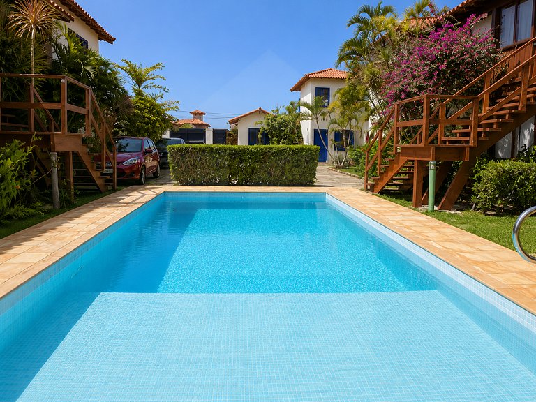Conforto e Piscina ao Lado da Praia