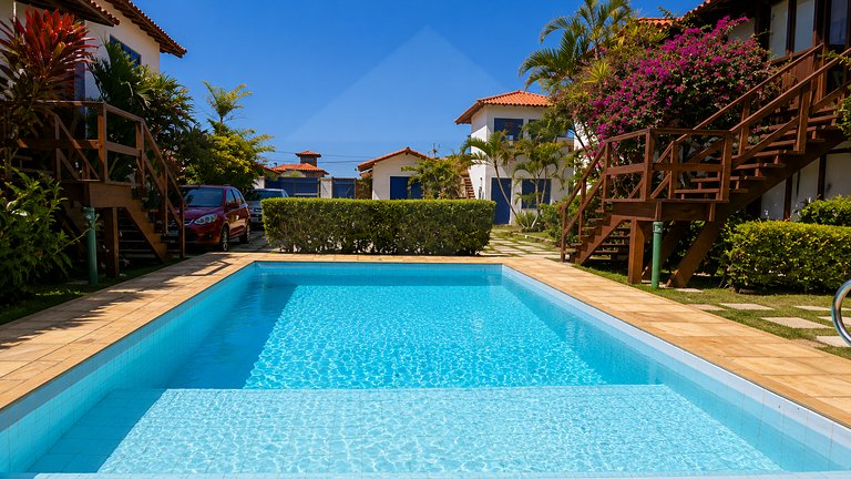 Conforto e Piscina ao Lado da Praia